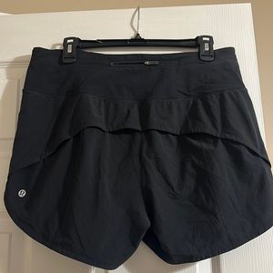 Gently used Lululemon Size 10 High Rise 4" Shorts